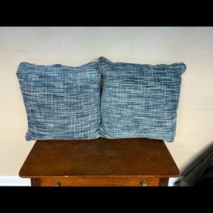 3 pillows. One is not pictured. Brand new